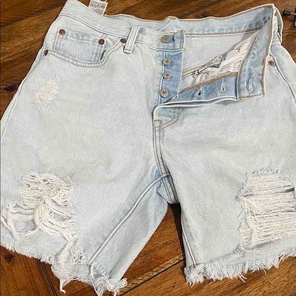 Levi's Pants - Levi’s 501 Mid Thigh Cutoff Denim Jean  Shorts light wash blue button fly  sz 27